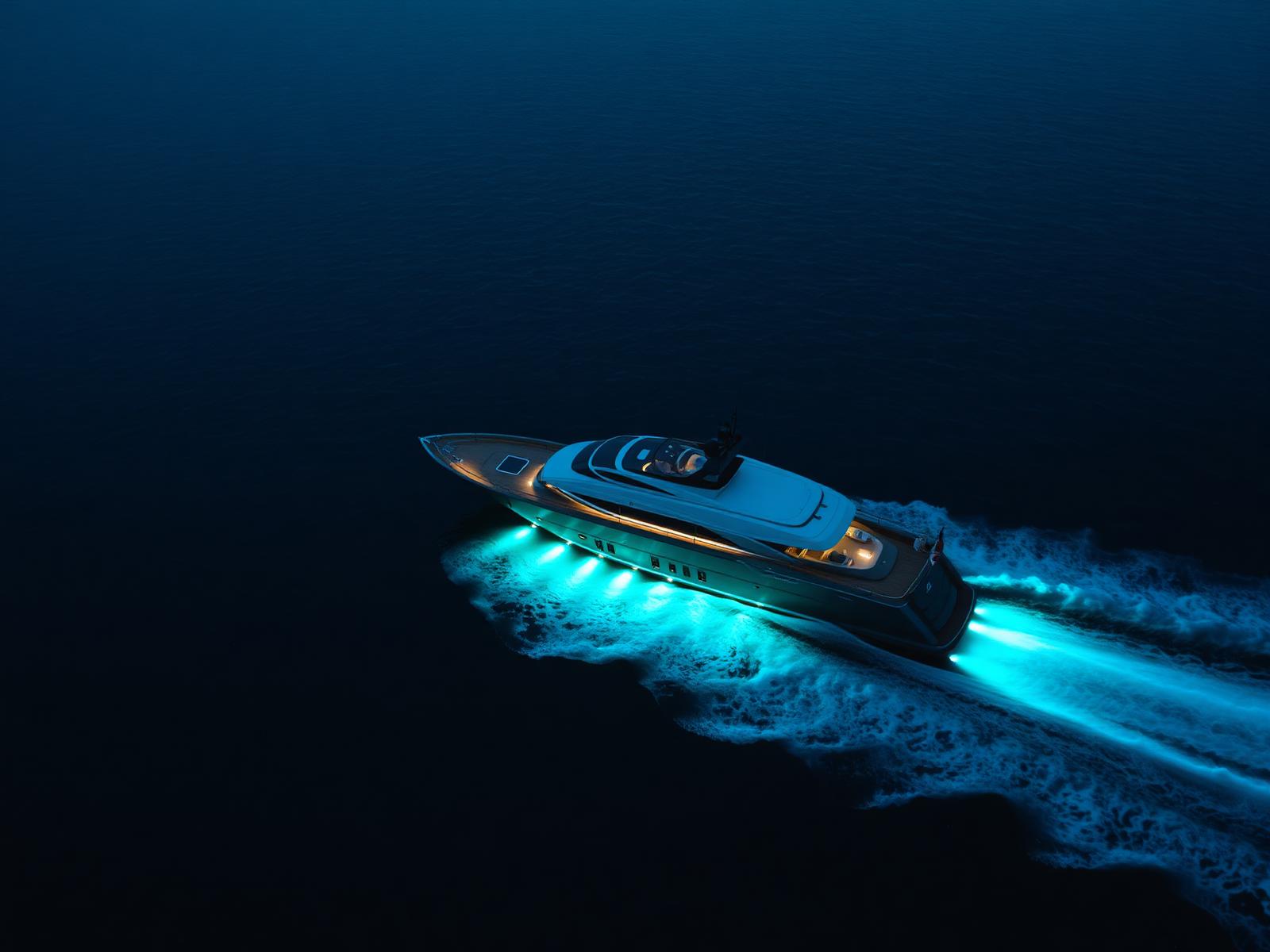 Luxury superyacht cruising at dusk